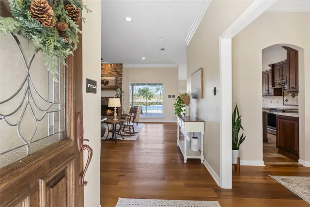 a view of a living room and a dining room with furniture