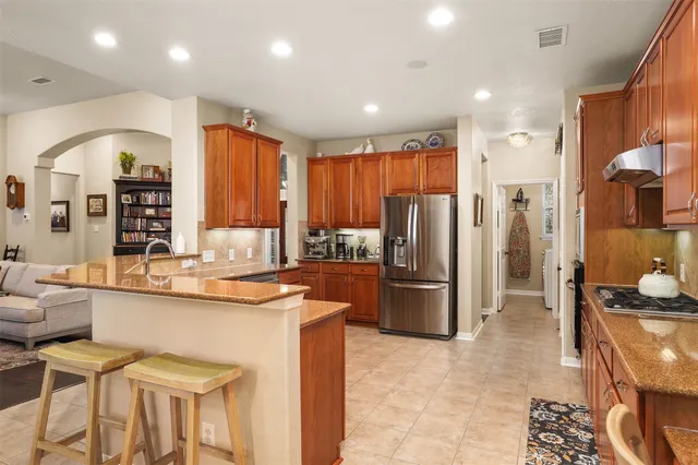 $585,000 | 43 East Hobbit Glen Drive, The Woodlands, TX 77384