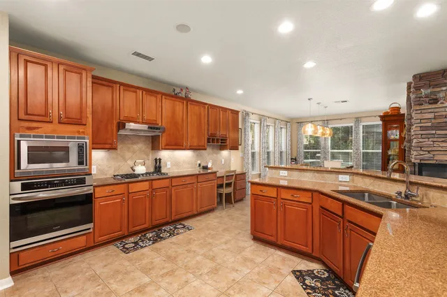 $585,000 | 43 East Hobbit Glen Drive, The Woodlands, TX 77384