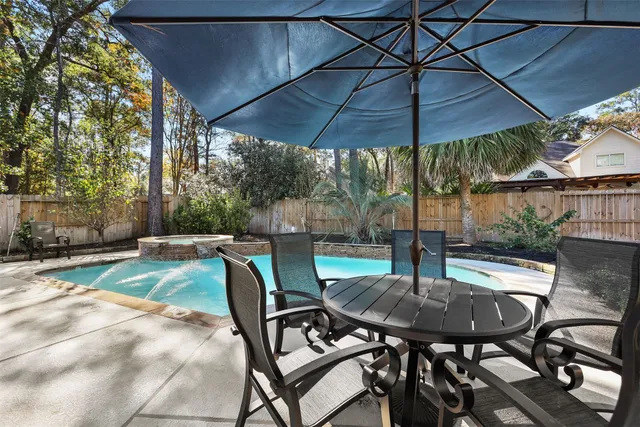 $585,000 | 43 East Hobbit Glen Drive, The Woodlands, TX 77384