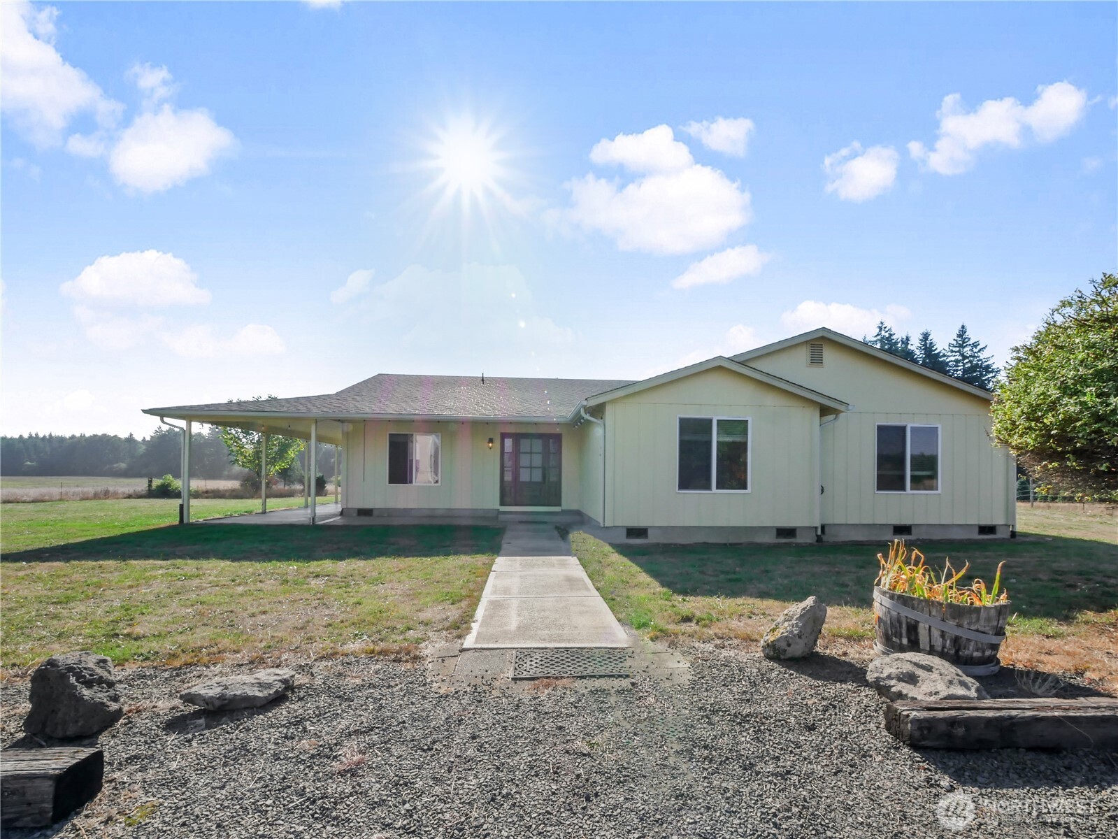 219 Jones Road Winlock, WA 98596 - Photo 2 of 35 a view of a house with a yard and a garden