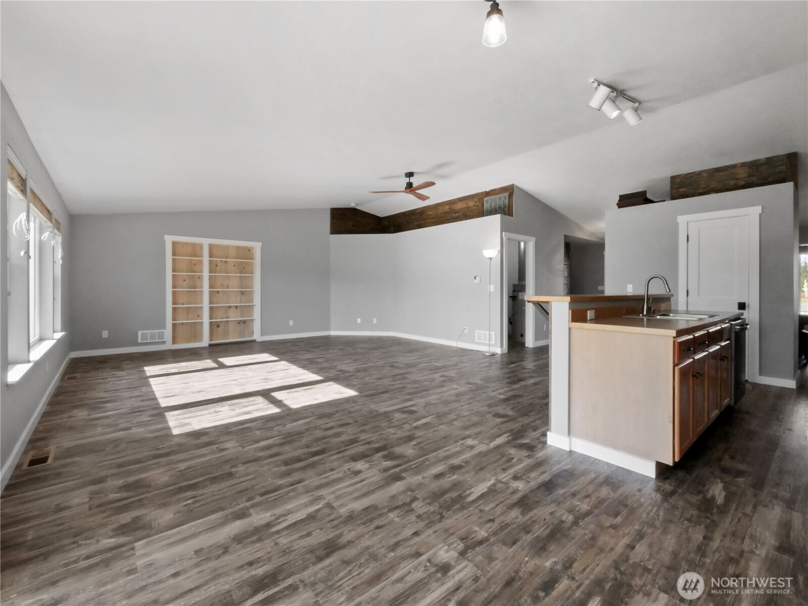 219 Jones Road Winlock, WA 98596 - Photo 7 of 35 a kitchen with granite countertop a refrigerator and a stove top oven