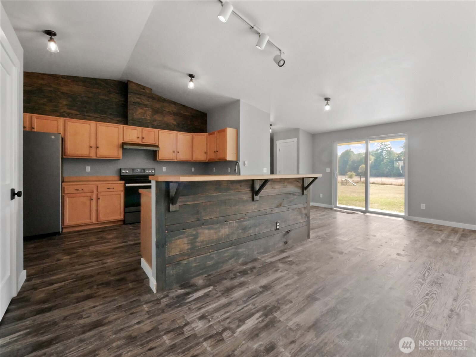 219 Jones Road Winlock, WA 98596 - Photo 10 of 35 a view of a kitchen with a sink and cabinets