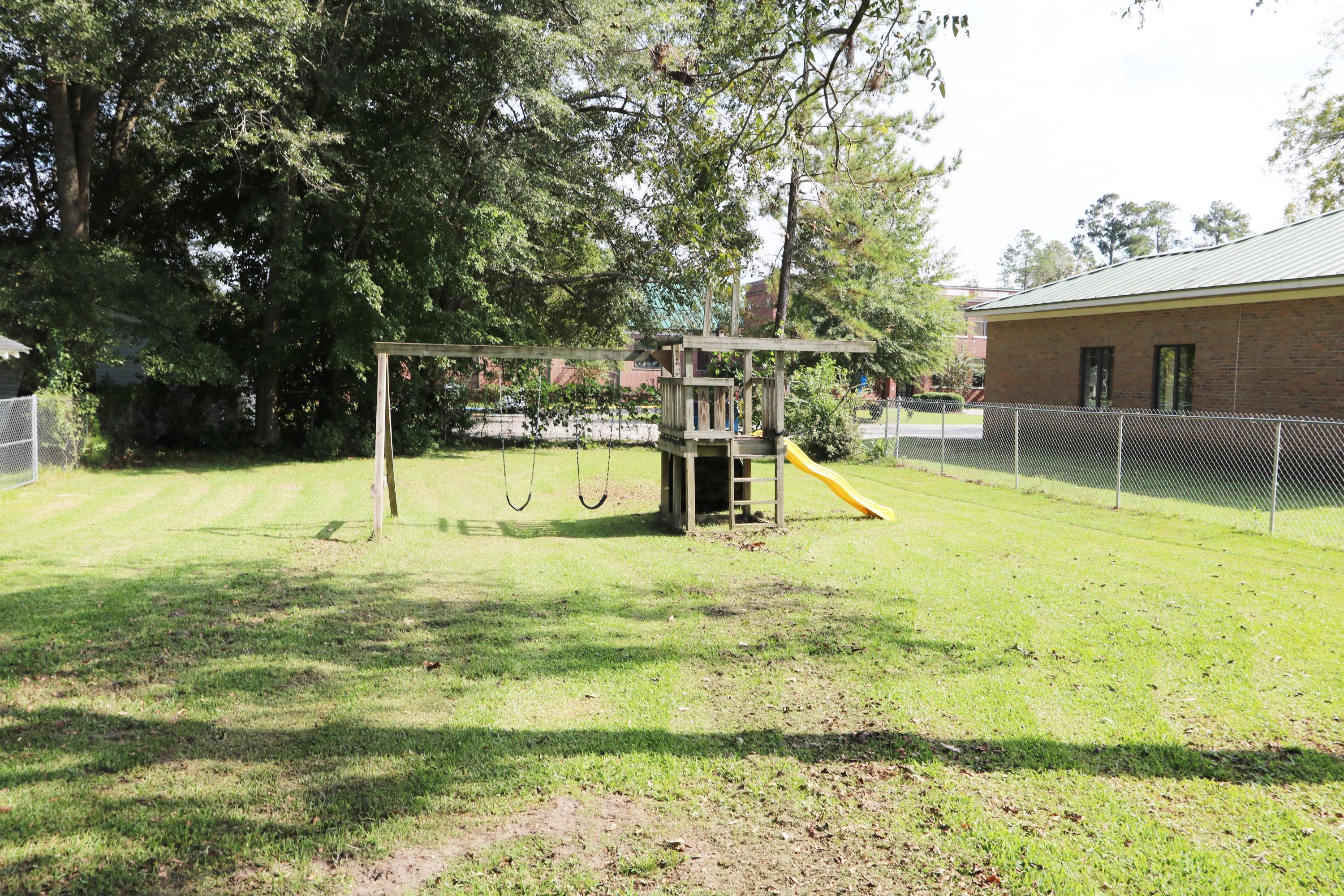 303 Johnston Street St. George, SC 29477 - Photo 19 of 20 Back Yard Play Set