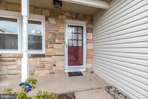 a front view of a house with an outdoor space