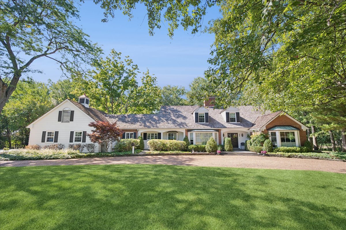 32 Meadowview Road Northfield, IL 60093 - Photo 1 of 69 a front view of a house with a yard