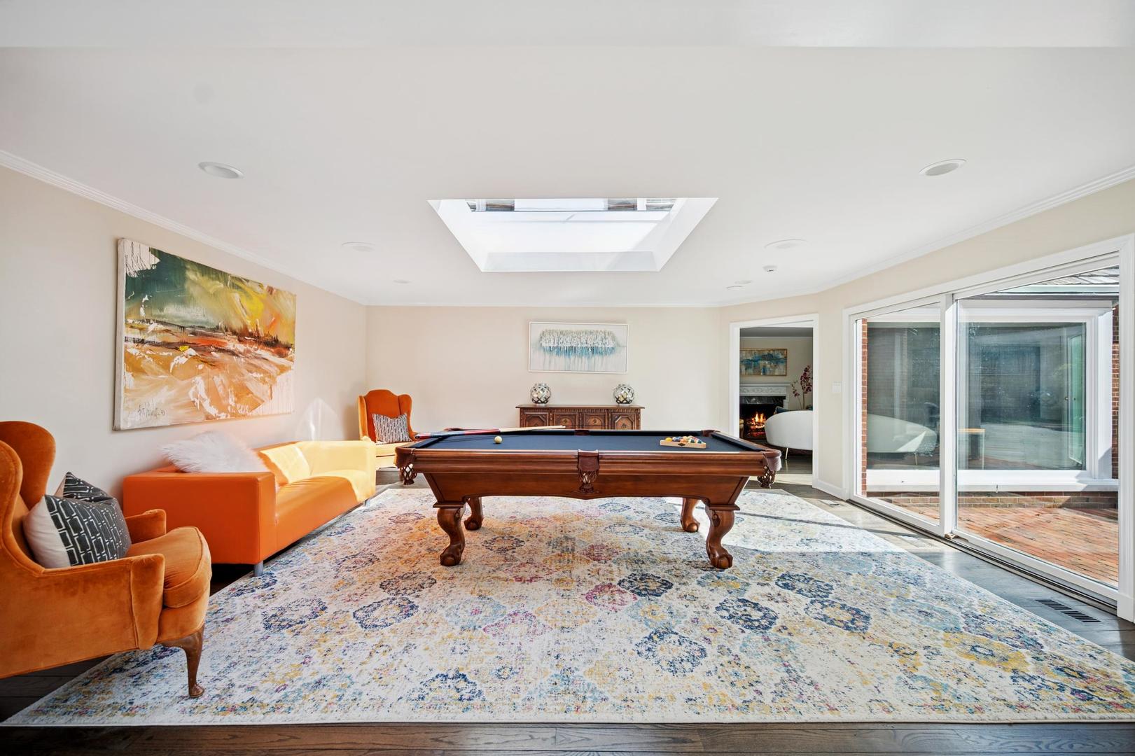 32 Meadowview Road Northfield, IL 60093 - Photo 32 of 69 a living room with furniture a rug and a large window