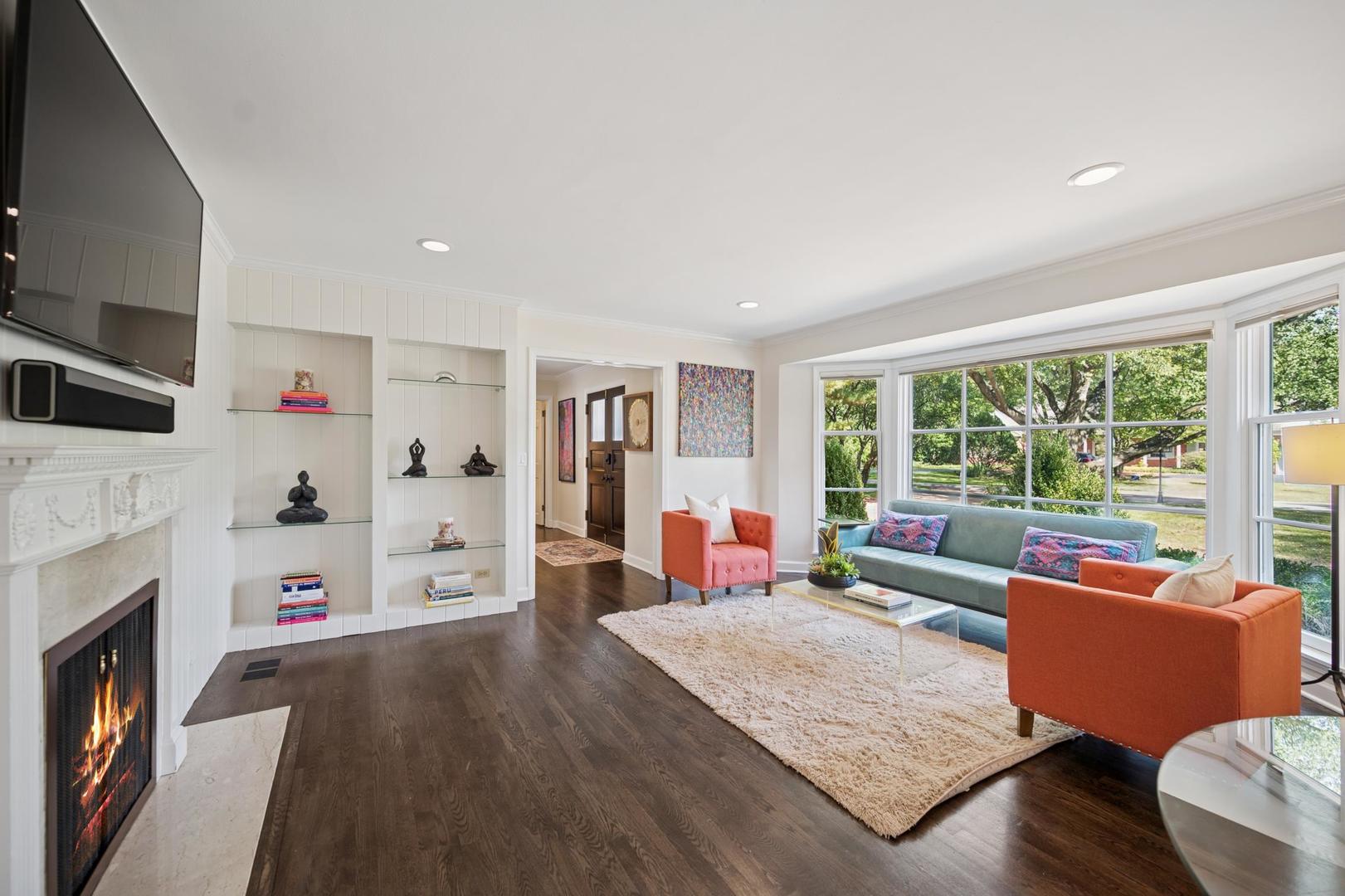 32 Meadowview Road Northfield, IL 60093 - Photo 34 of 69 a living room with furniture and a fireplace