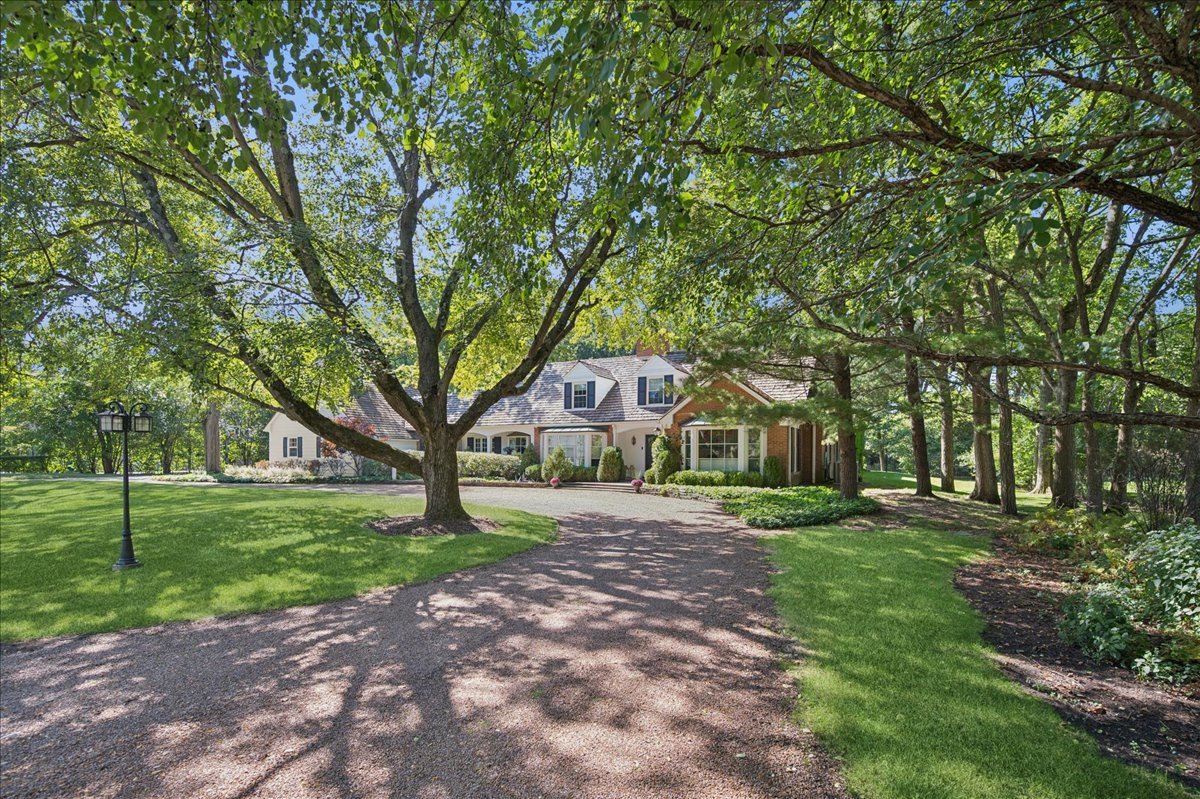 32 Meadowview Road Northfield, IL 60093 - Photo 4 of 69 a front view of a house with a yard