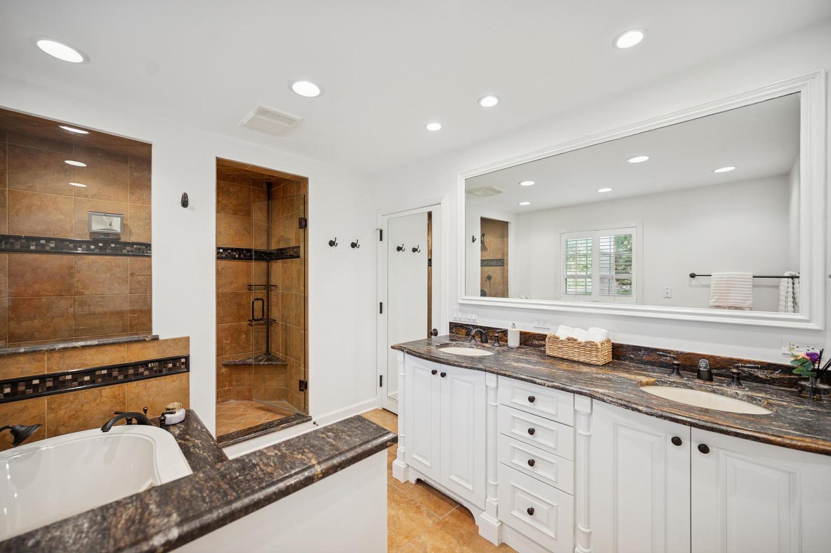 32 Meadowview Road Northfield, IL 60093 - Photo 41 of 69 a bathroom with a granite countertop sink and a mirror