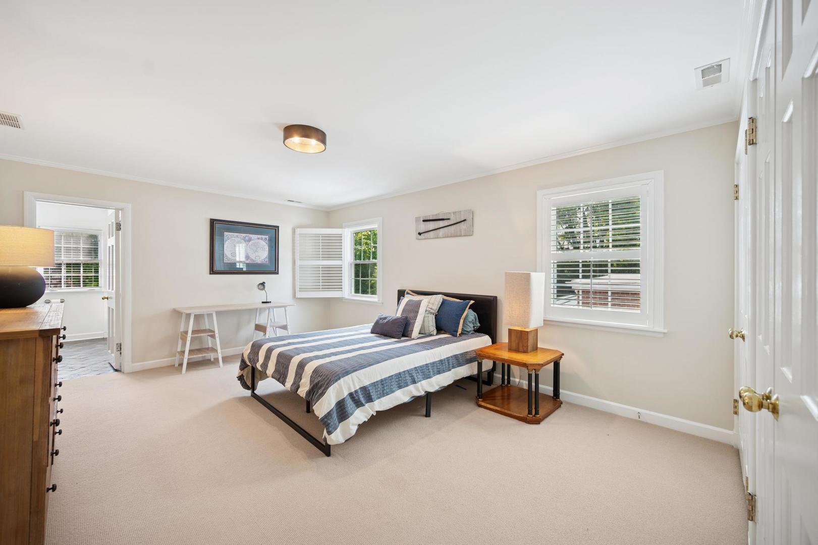 32 Meadowview Road Northfield, IL 60093 - Photo 49 of 69 a bedroom with a bed and a window