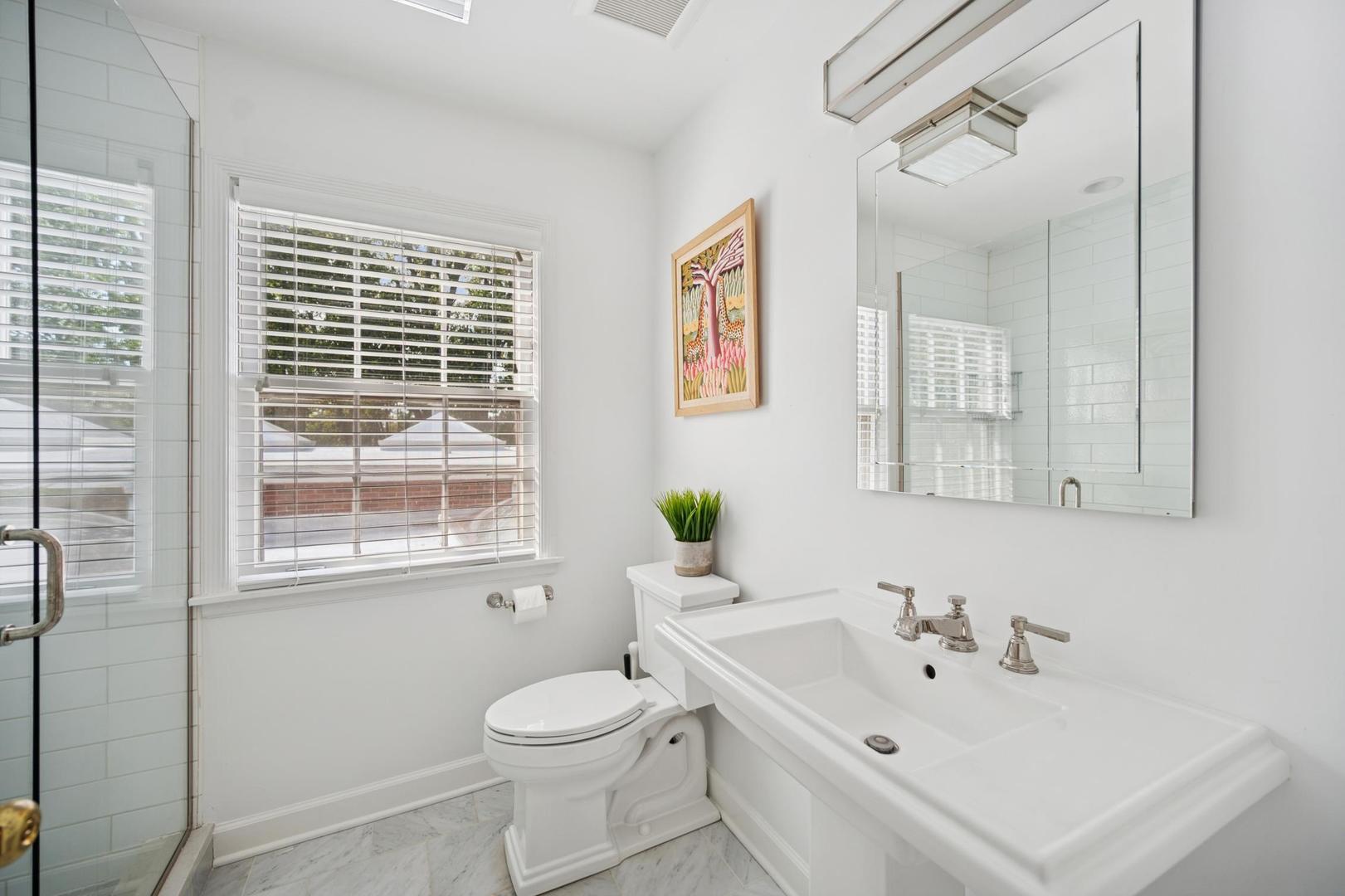 32 Meadowview Road Northfield, IL 60093 - Photo 52 of 69 a bathroom with a sink a toilet and a bathtub