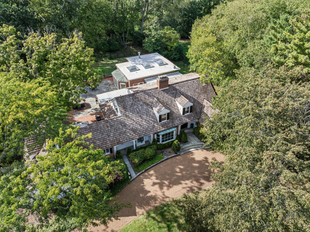 32 Meadowview Road Northfield, IL 60093 - Photo 61 of 69 a view of a house with a yard and large trees