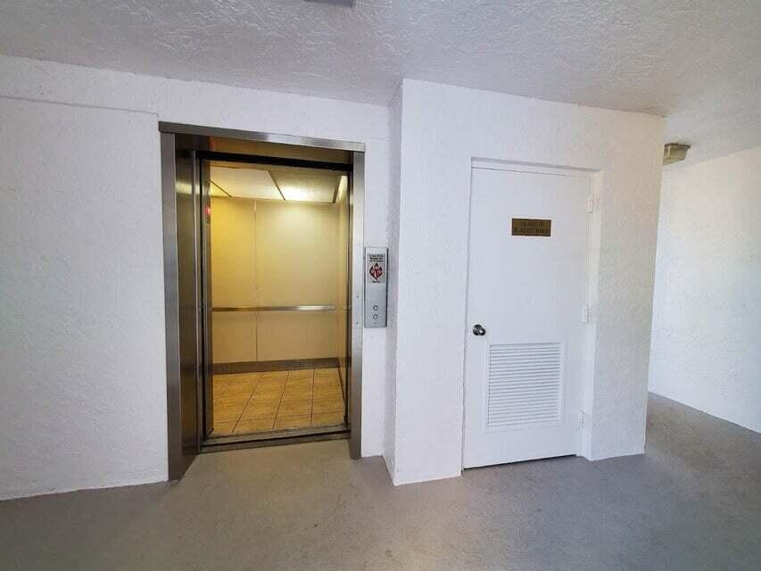 1605 Highway 1, Unit F203 Jupiter, FL 33477 - Photo 33 of 39 Building elevator
