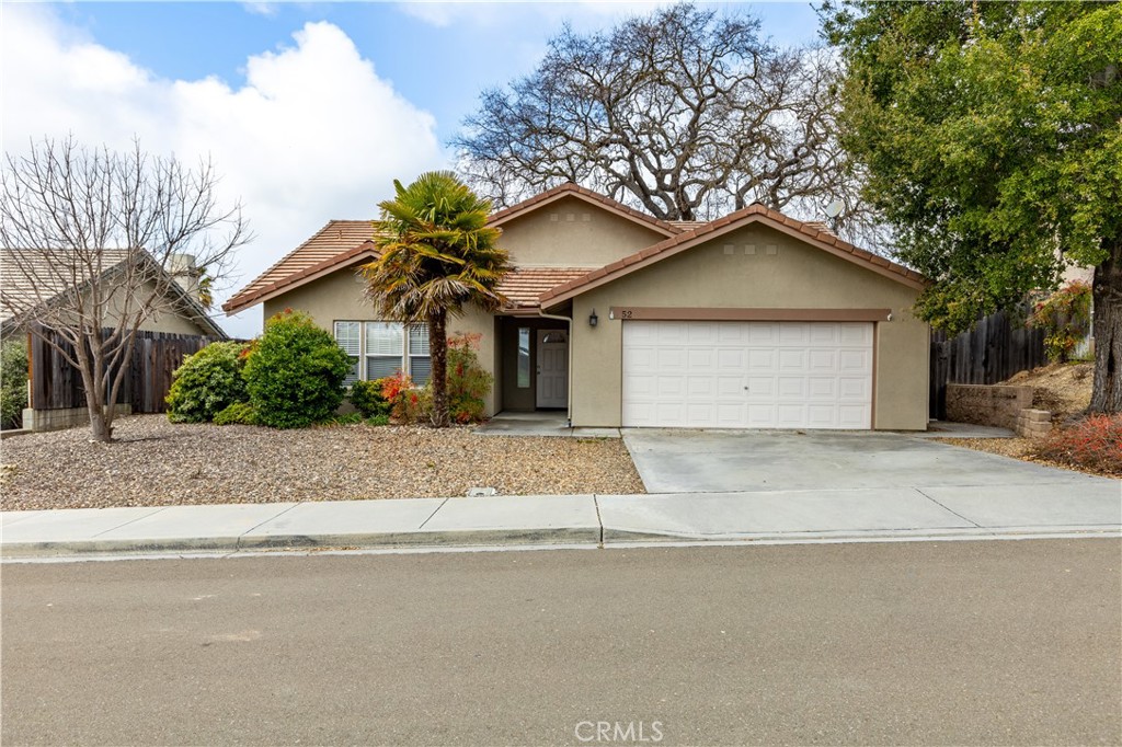 52 Sunnyside Way Templeton, CA 93465 - Photo 1 of 41 a front view of a house with a yard and garage
