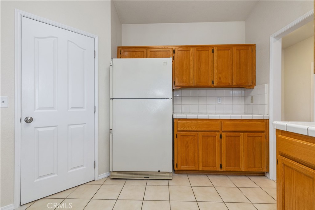 52 Sunnyside Way Templeton, CA 93465 - Photo 12 of 41 a view of a refrigerator in the kitchen
