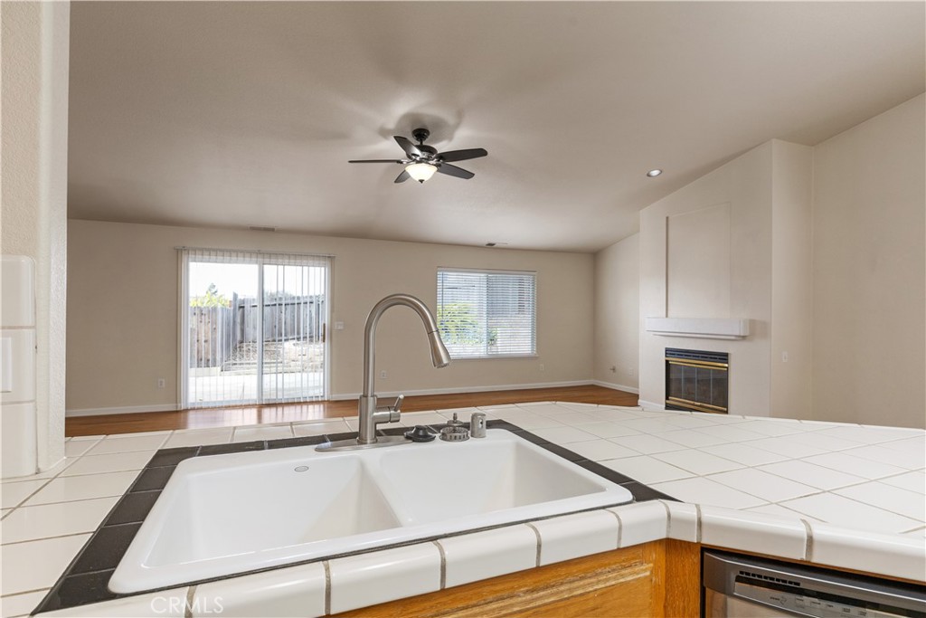 52 Sunnyside Way Templeton, CA 93465 - Photo 14 of 41 a open kitchen with a sink and microwave