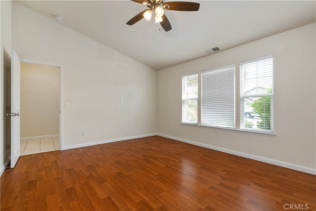 52 Sunnyside Way Templeton, CA 93465 - Photo 17 of 41 a view of an empty room with wooden floor and a window