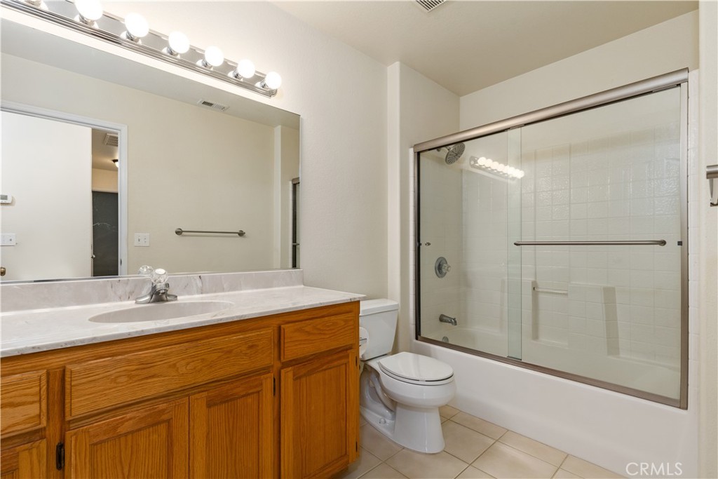 52 Sunnyside Way Templeton, CA 93465 - Photo 23 of 41 a bathroom with a sink a toilet and shower