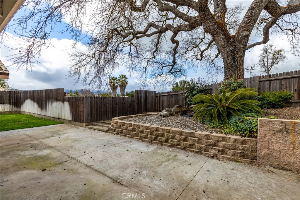 52 Sunnyside Way Templeton, CA 93465 - Photo 33 of 41 a view of a backyard with wooden fence