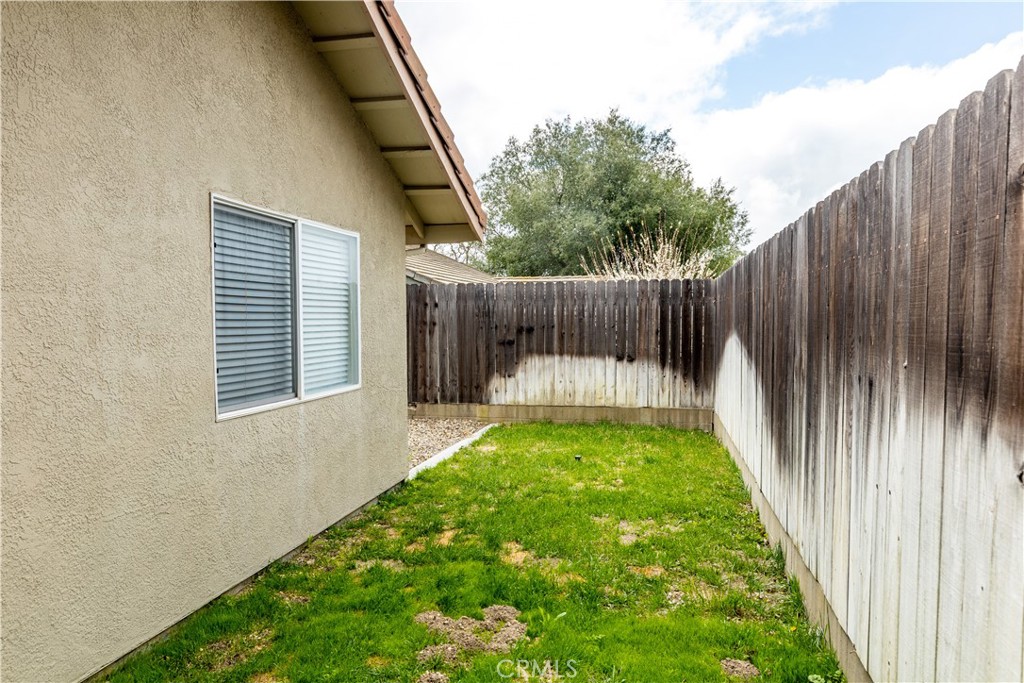 52 Sunnyside Way Templeton, CA 93465 - Photo 34 of 41 a view of small garden with wooden fence
