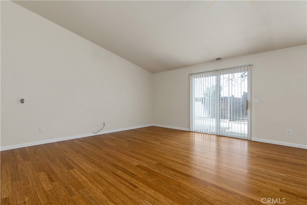 52 Sunnyside Way Templeton, CA 93465 - Photo 5 of 41 a view of an empty room with wooden floor and a window