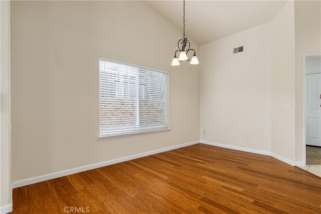 52 Sunnyside Way Templeton, CA 93465 - Photo 9 of 41 a view of empty room with wooden floor and fan