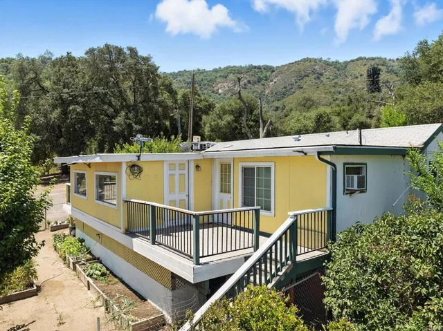 a view of a house with a deck