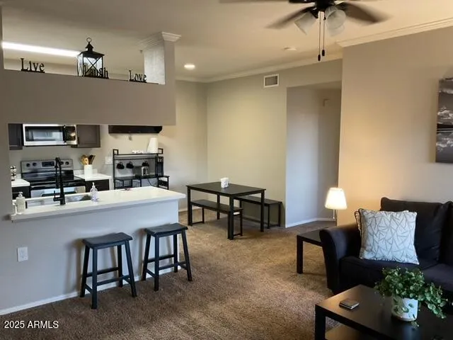 a kitchen with a table and chairs in it