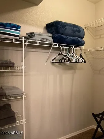 a table with a stove and a wooden floor