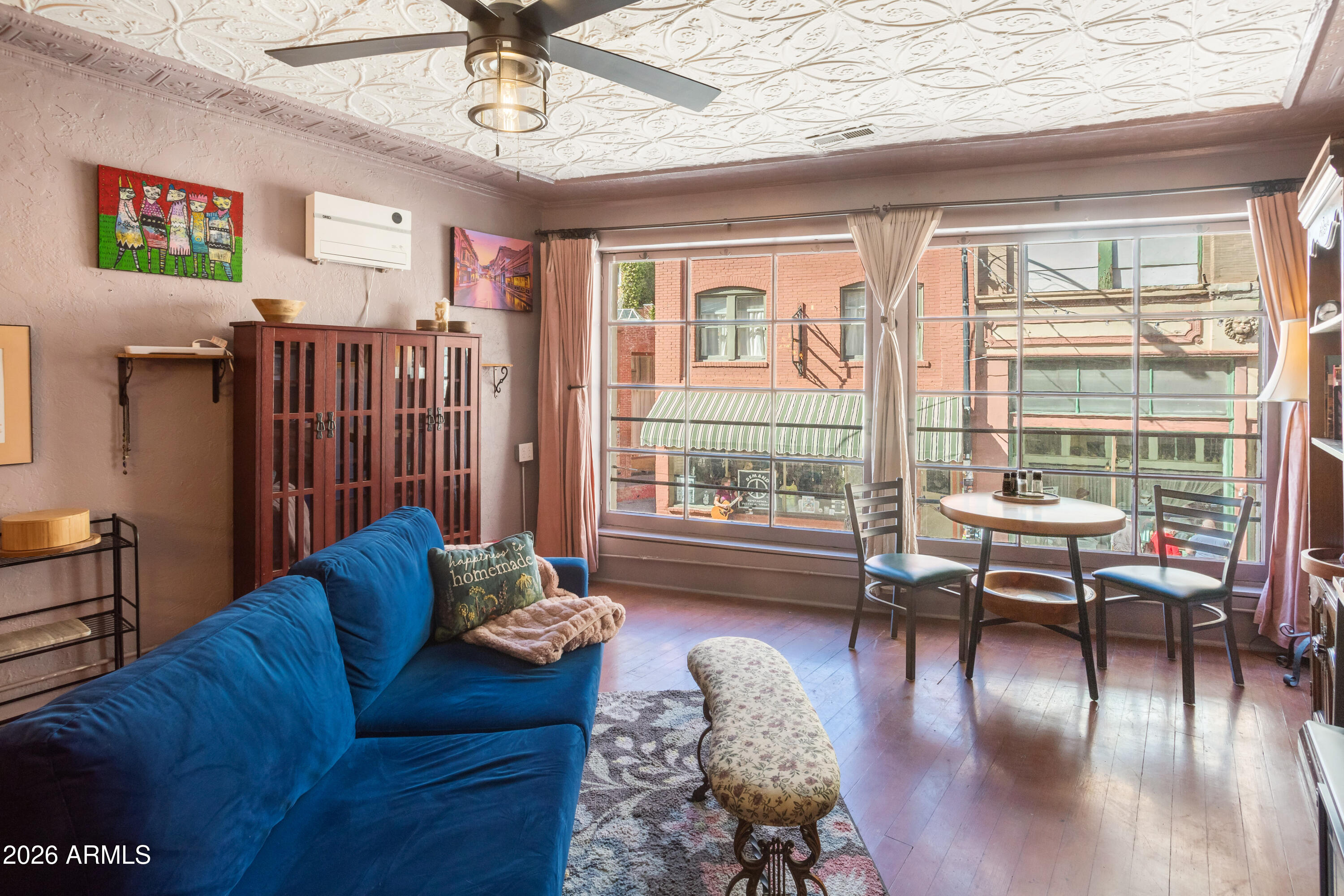 40 Main Street Bisbee, AZ 85603 - Photo 5 of 37 a living room with furniture and a large window