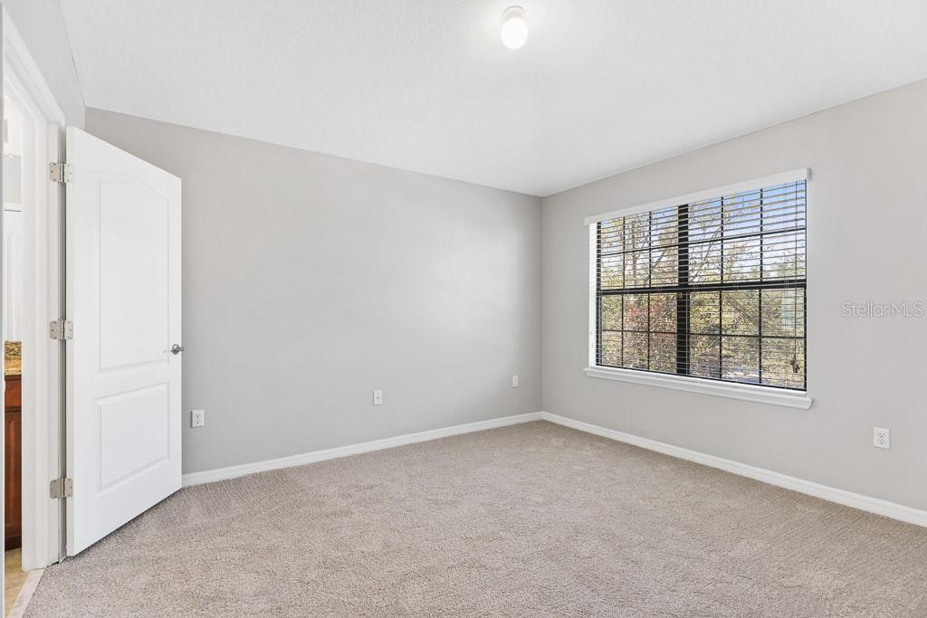 5738 Kingletsound Lithia, FL 33547 - Photo 14 of 32 an empty room with a window