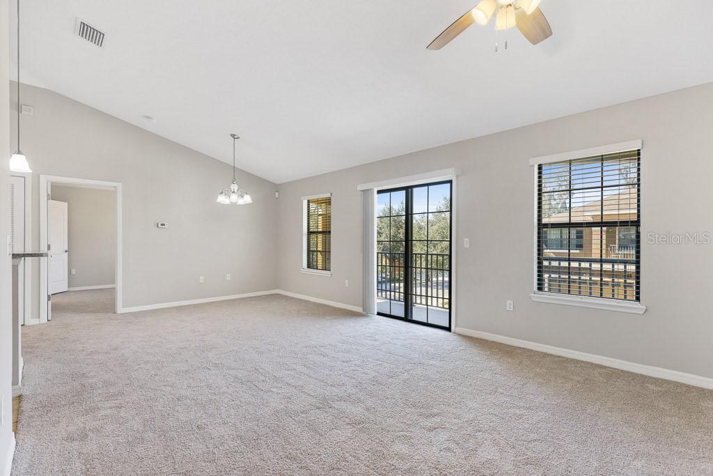 5738 Kingletsound Lithia, FL 33547 - Photo 9 of 32 a view of an empty room with a window