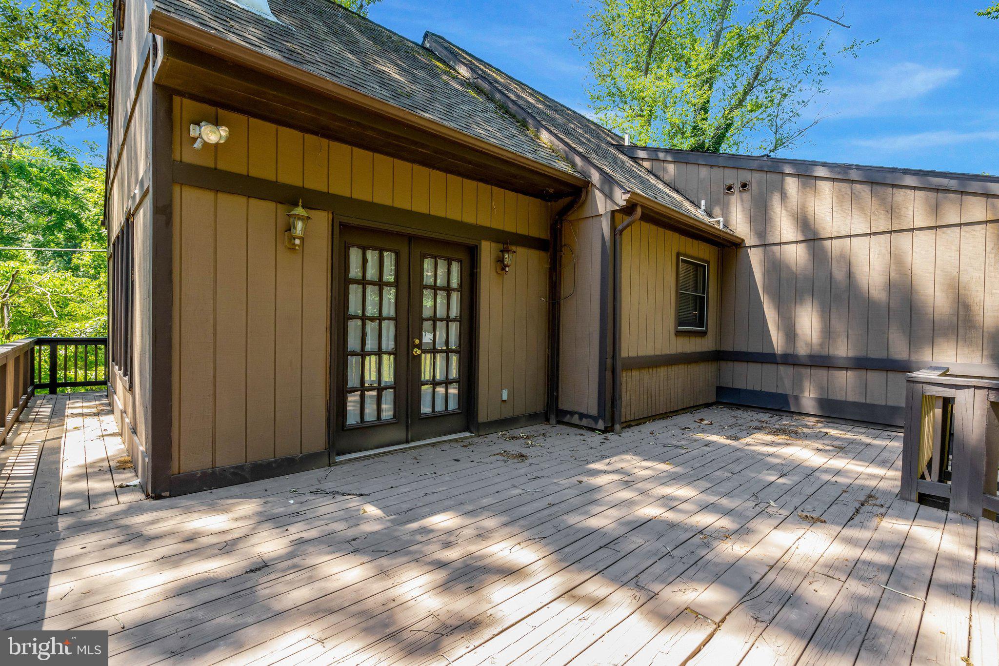 8844 McGrath Road Manassas, VA 20112 - Photo 4 of 27 Charming deck with serene woodland views.