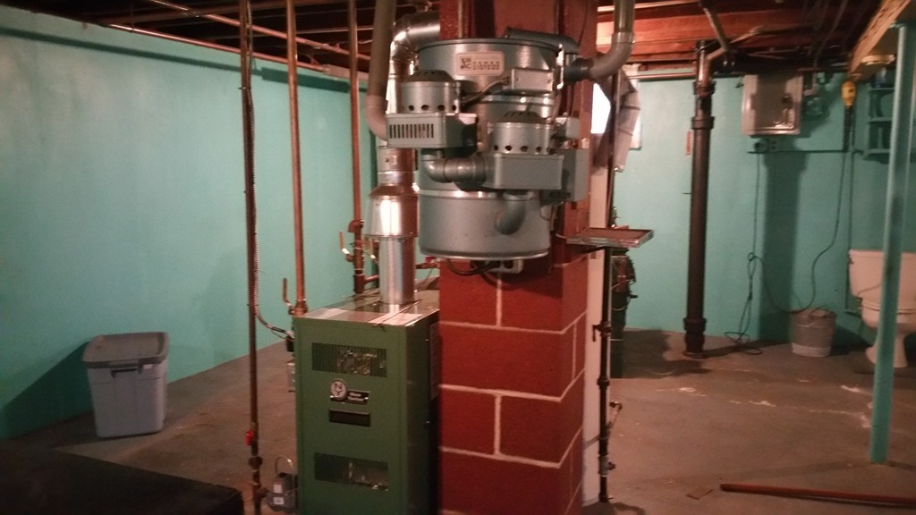 10 Jackson Street Fall River, MA 02721 - Photo 8 of 12 a close view of water heater room