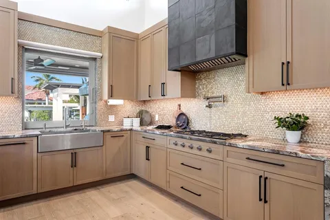 a view of a lake with a house in the background