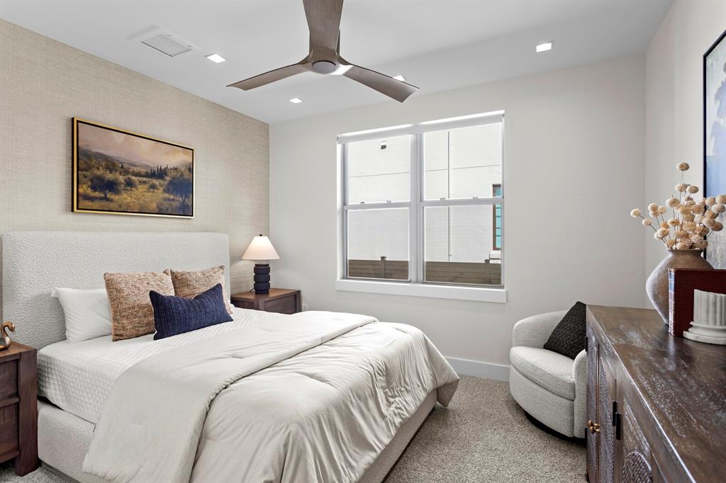 5129 West Neptune Way Tampa, FL 33609 - Photo 45 of 77 a bedroom with a bed and a couch