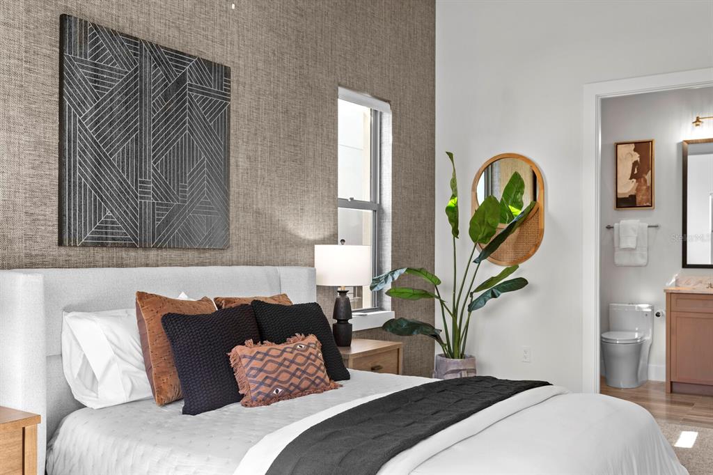 5129 West Neptune Way Tampa, FL 33609 - Photo 54 of 77 a bedroom with a bed and window