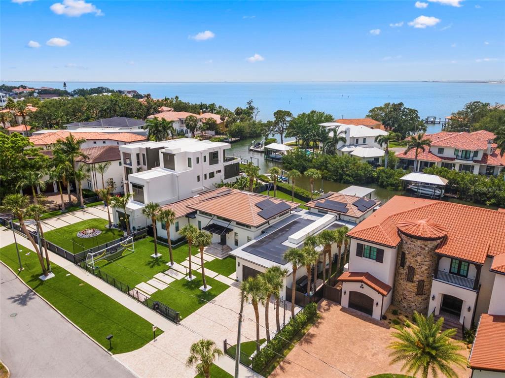 5129 West Neptune Way Tampa, FL 33609 - Photo 9 of 77 an aerial view of residential houses with outdoor space and street view