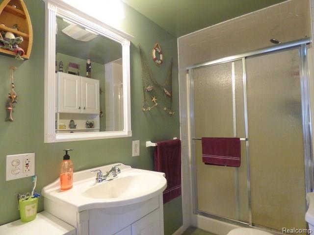 8845 Riverside Drive Brighton, MI 48116 - Photo 13 of 19 13 MAIN FLOOR BEDROOM.jpg