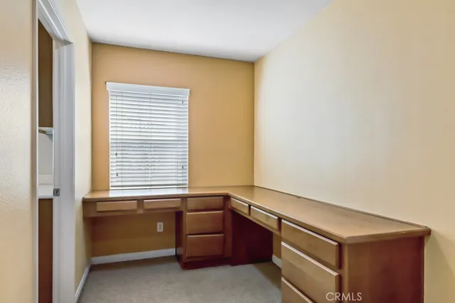 a room with window and furniture