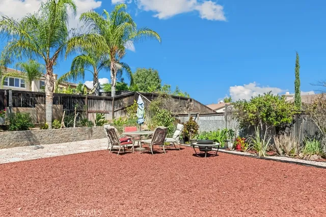 a view of a table and chairs in patio