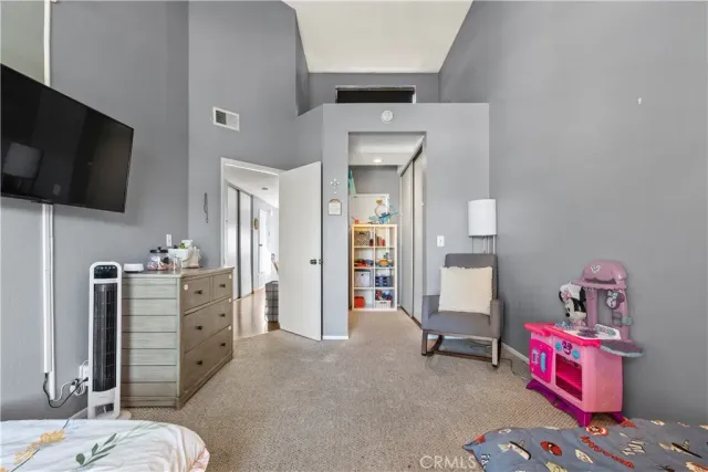 a view of a bedroom with baby toys