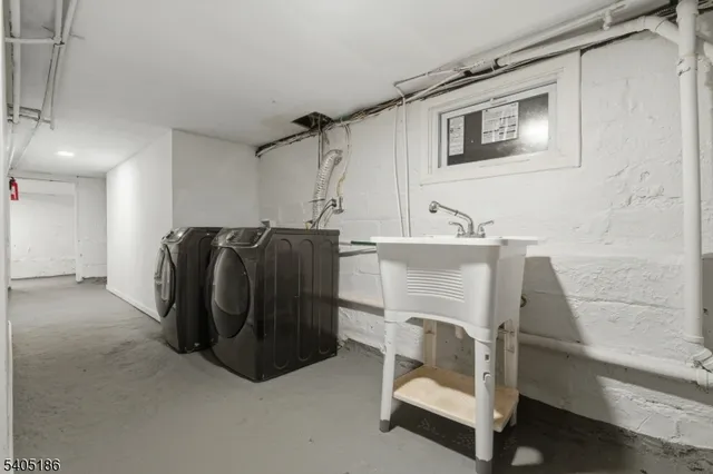 a utility room with a washer and dryer