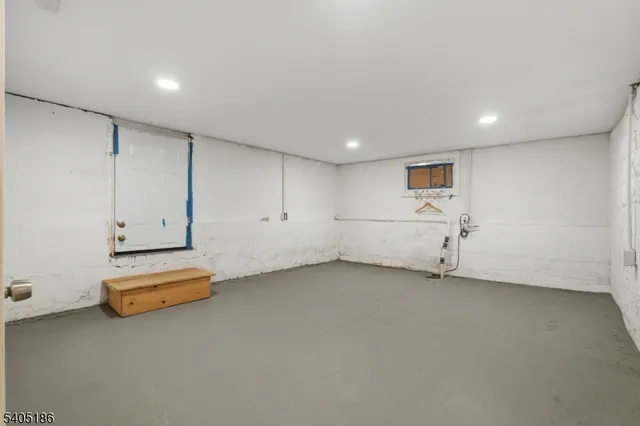 a view of room with air conditioner and window