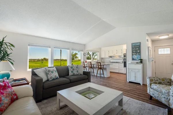 a living room with furniture and a table
