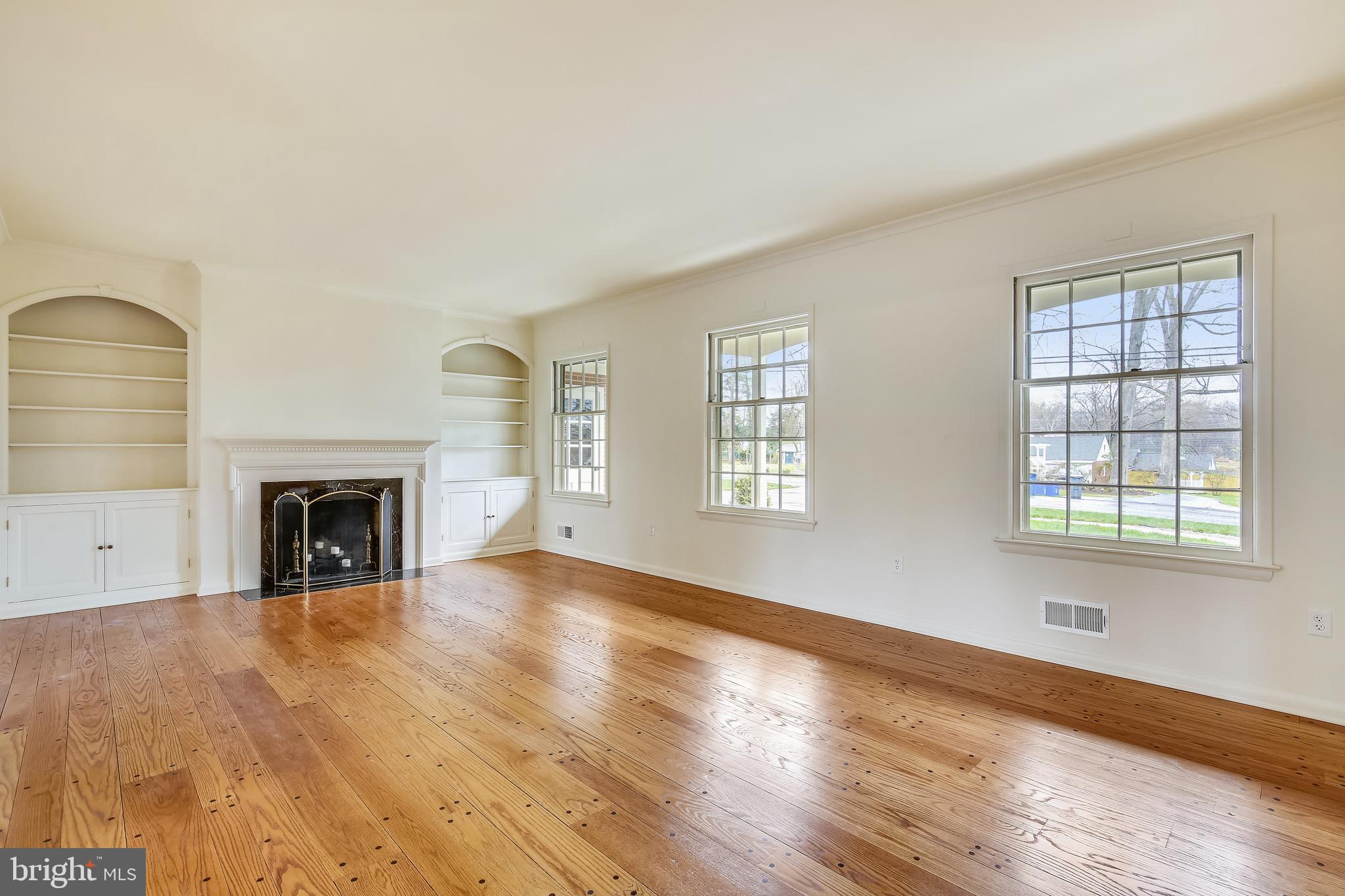 10416 Naglee Road Silver Spring, MD 20903 - Photo 5 of 29 Sunken living room with wood burning fireplace