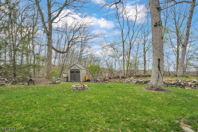 14 Woods Edge Road Stanhope, NJ 07874 - Photo 11 of 25 a view of a house with a yard
