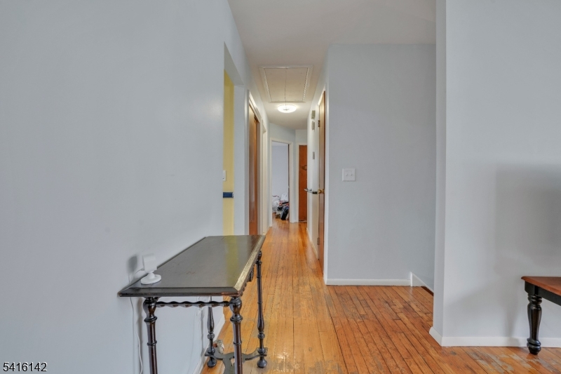 14 Woods Edge Road Stanhope, NJ 07874 - Photo 16 of 25 a view of a livingroom with wooden floor