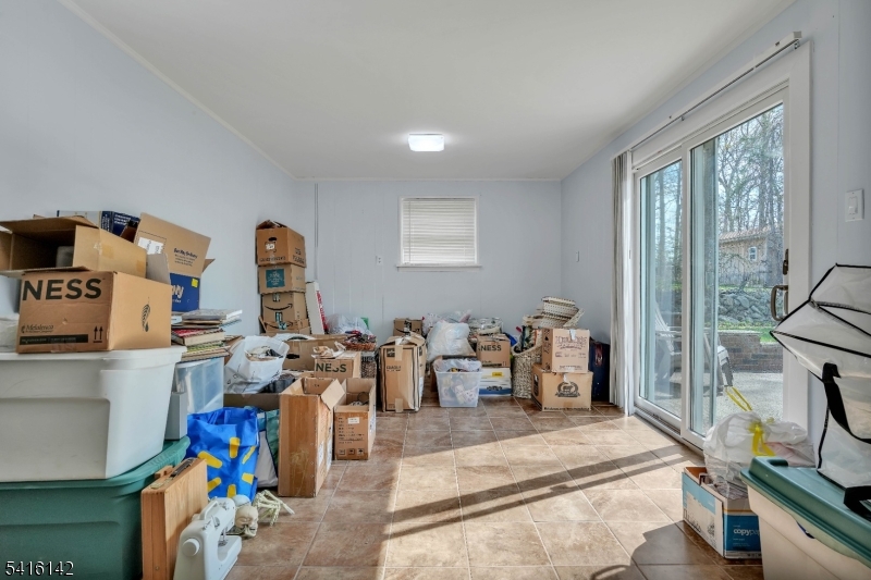 14 Woods Edge Road Stanhope, NJ 07874 - Photo 20 of 25 a living room with furniture and a flat screen tv